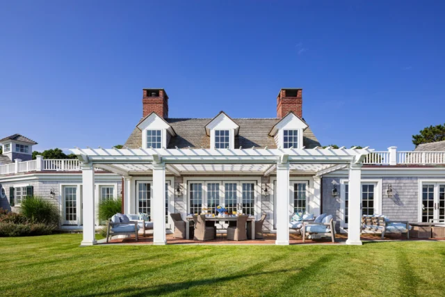 A study in coastal architecture, where classic Cape Cod forms meet an effortless outdoor lifestyle. Pergolas, gabled rooflines, and water’s-edge terraces create a dialogue between timeless design and its natural surroundings.

Architect: @patrickahearnarchitect 
Builder: @whitlabrothersbuilders 
Photo Credit: @gregpremru