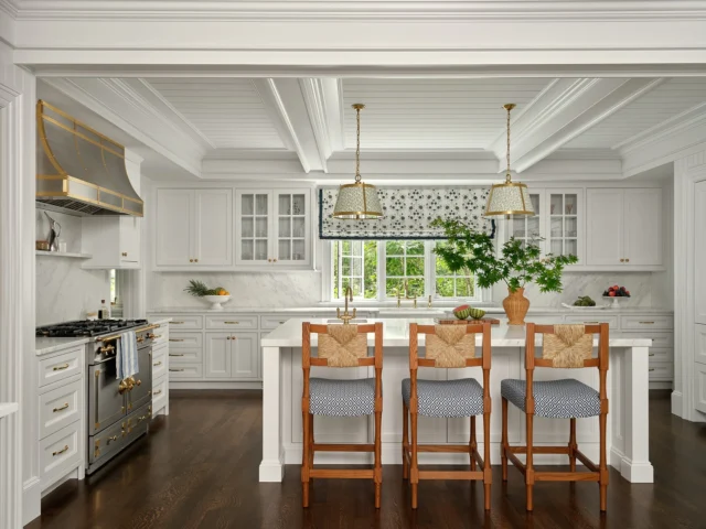 In this custom kitchen just outside Boston, coffered ceilings and tailored millwork set a timeless architectural framework. A statement brass-accented range hood and luminous natural light elevate the space, marrying classical proportions with a refined, modern sensibility.
 
Architect: @patrickahearnarchitect
Builder: @falloncustomhomes
Interior Designer: @annsleyinteriors
Photo Credit: @seanlitchfield
