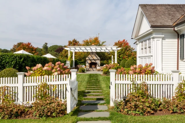 Areas for outdoor living were purposely programmed at this newly built New Hampshire home. A stone patio featuring a proud chimney offers an inviting place to gather on cool fall evenings.

Architecture: @patrickahearnarchitect
Builder: @falloncustomhomes 
Landscape: @sudburydesigngroup 
Photo Credit: @taylor.allegrini