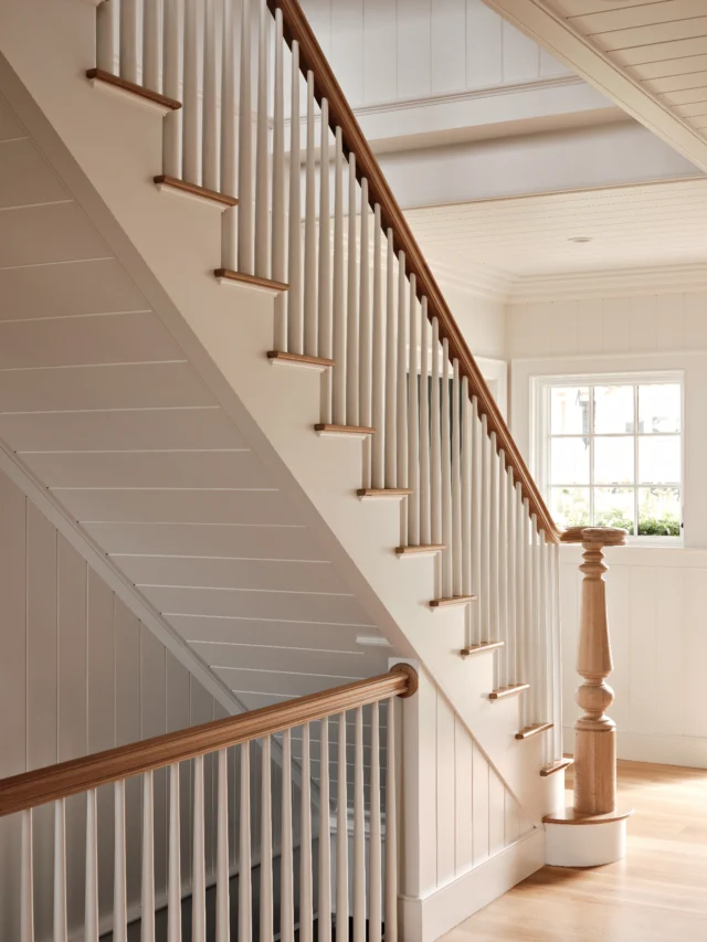 At this newly built North Falmouth residence, an open stair invites visitors to move through the home with ease. Custom milled crown and abundant v-groove paneling offers historic character.

Architect: @patrickahearnarchitect
Builder: @hallidaybuilders​​​​​​​​
Interior Designer: @leighdyerdesign​​​​​​​​
Photographer: @dancutronaphoto