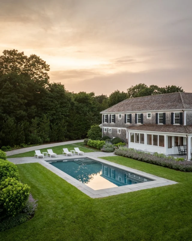 Overlooking the pool and rolling lawns to the main home and bay beyond, this restored Duxbury guest house brings a quiet sense of history to a landscape shaped for relaxed coastal living.

Architecture: @patrickahearnarchitect
Builder: @jbrobbiecustomhomes
Photo Credit: @crucinski_