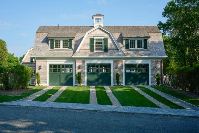 Designed as both a functional carriage house and an extension of the property’s outdoor living, this multi-purpose structure opens seamlessly to the lawn and pool beyond, creating a relaxed gathering space for summer entertaining in Osterville. 

Architecture: @patrickahearnarchitect 
Builder: @ejjaxtimerbuilderinc
Interior Designer: @trellishomedesign
Landscape: ML Curadossi Landscape Design
Stylist: @karinlidbeck
Photo Credit: @janebeilesphoto
