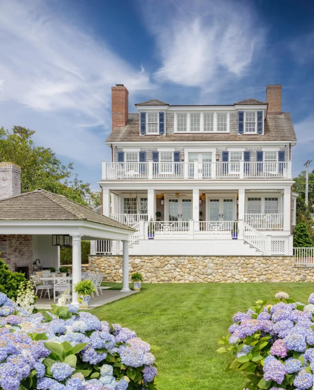 Sited along Edgartown Harbor beside other Patrick Ahearn Architect-designed homes, this historically inspired new residence feels as authentic as the structures that surround it. Materials including cedar shingles, brick chimneys, a stone veneered foundation, and white trim accented by traditional blue shutters speak the architectural language of the Historic District.

Architecture: @patrickahearnarchitect
Builder: @colonial_reproductions
Photo 1 Credit: @michaeljleephotography
Photo 1 Styling: @juliahefthome
Photo 2 Credit: @crucinski_
