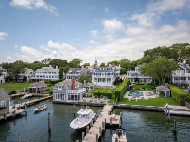 In this image of the Edgartown Village Historic District on Martha's Vineyard, every home in view along the harbor has been touched by the hands of Patrick Ahearn Architect. Whether renovated sensitively to respect and protect centuries-old structures or built anew to blend seamlessly into their surroundings, these residences tug at the heartstrings with their timeless appeal.

Architecture: @patrickahearnarchitect
Photo Credits: @crucinski_