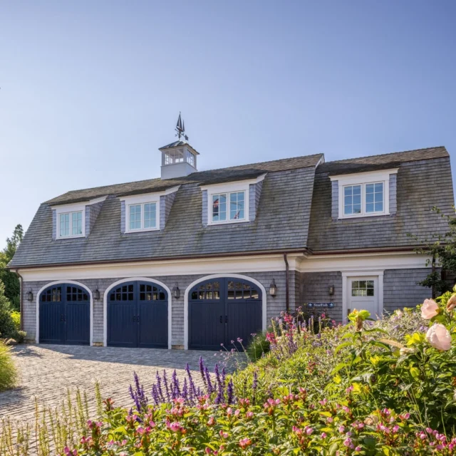 In Edgartown, the carriage house wing at this newly built residence features operable doors that swing wide from the center, imbuing the structure with timeless character. See more of the home in Patrick's forthcoming book Driven: The Road to Iconic Design available for preorder at the link in our bio.

Architecture: @patrickahearnarchitect
Builder: @colonial_reproductions
Photo Credit: @crucinski_