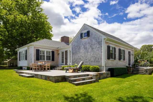 A new rear bluestone patio at Duxbury's Fred H. and Martha Pratt house introduces indoor/outdoor living opportunities where none had previously existed.

Architecture: @patrickahearnarchitect
Builder: @colcloughconstruction
Landscaping: @abladeofgrass_inc
Photo Credit: @gregpremru