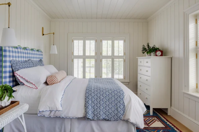 A comfortable guest bedroom in Duxbury's historic Fred H. and Martha Pratt house offers architectural detail to please, including beadboard clad walls and ceiling, thick window casings, and traditional crown molding.

Architecture: @patrickahearnarchitect
Builder: @colcloughconstruction
Landscaping: @abladeofgrass_inc
Photo Credit: @gregpremru