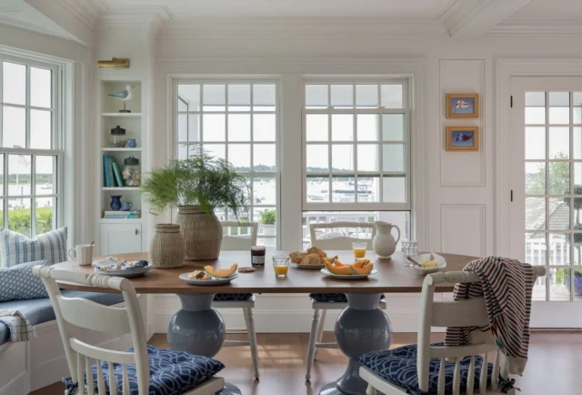 Traditional twelve-over-twelve fenestration patterns are seen on the windows of this newly built home overlooking Edgartown Harbor, adding an element of implied history to the residence. 

Architecture: @patrickahearnarchitect
Builder: @colonial_reproductions
Interior Design: @lesliefineinteriors
Photo Credit: @michaeljleephotography
Styling: @juliaheffhome