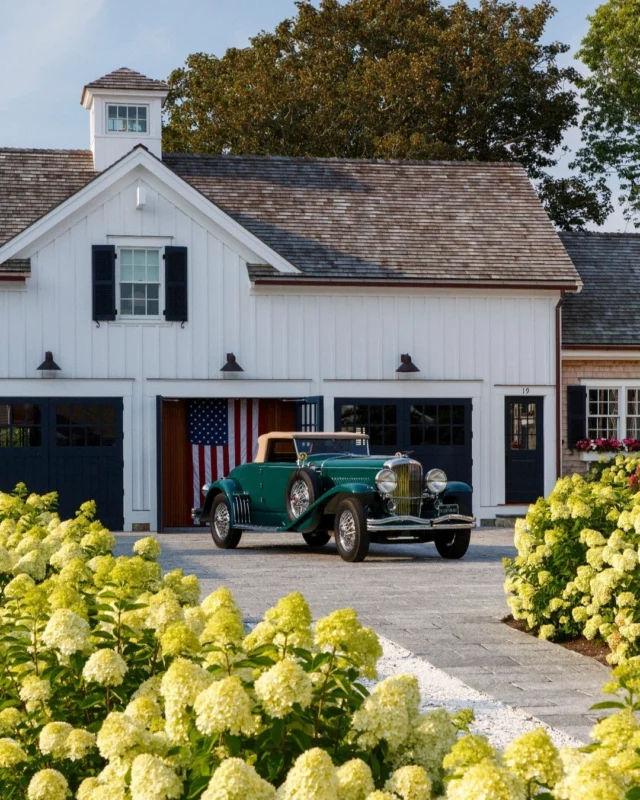 In Driven: The Road to Iconic Design, Patrick shares his ambitious pursuit of the extraordinary with a focus on bespoke carriage houses featured in so many of his legacy properties and classic cars that have shaped his design purview, including this magnificent 1930 Duesenberg and residence. See more of the property within the pages of the book - find the link to preorder in our bio.

Architecture: @patrickahearnarchitect
Builder: @spencerandcompanybuilders
Landscape: @dangordonla
Photo Credit: @taylor.allegrini