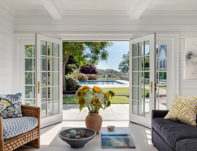 In Chatham, glass-paned French doors reinforce the connection between indoors and out, opening this carriage house to the pool and long views of Mill Pond. Above, a second-floor lounge and sundeck offer another vantage point to take in the waterfront setting.

See more of the structure in Patrick’s forthcoming book Driven: The Road to Iconic Design, available for preorder via the link in our bio.
⠀⠀⠀⠀⠀⠀⠀⠀⠀
Architecture: @patrickahearnarchitect
Builder: @whitlabrothersbuilders
Interior Design: @annsleyinteriors
Photo Credit: @gregpremru
Styling: @juliaheffhome