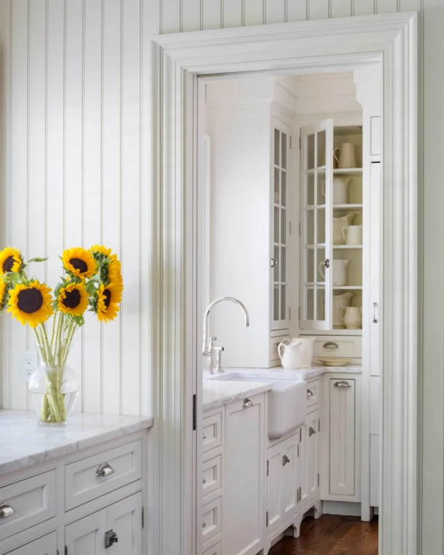 A light-filled scullery serves as a natural extension of the kitchen, pairing timeless detailing with everyday utility. Though modest in scale, it played an important role in the restoration of the 1845 Captain Consider Fisher House in Edgartown Village, reimagined for both intimate living and entertaining.

Architecture: @Patrickahearnarchitect
Builder: @colonial_reproductions
Photo Credit: @gregpremru