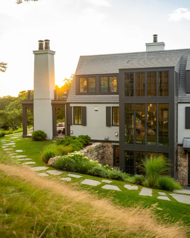 Chilmark’s strict height restrictions became an opportunity for inventive design. Working with the land’s natural slope, the home was carefully sited to accommodate a walk-out lower level and two floors above, while a steeply pitched roof creates a sense of volume within the 24-foot height limit.

Architecture: @patrickahearnarchitect
Builder: @rosbeckbuilders
Landscape Architect: @dangordonla
Photo Credit: @landinophoto