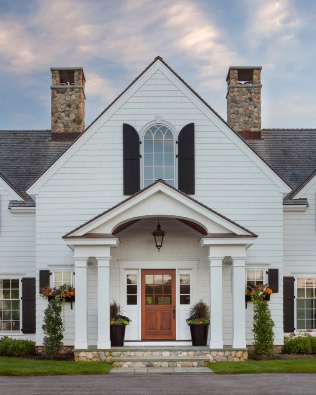 At this classic Colonial Revival in Dover, Massachusetts, a gracious main entry and nearby family entrance evoke the enduring romance of New England architecture, where traditional formality meets the understated elegance of everyday living.

Architecture: @patrickahearnarchitect
Builder: @sweeneycustomhomes
Photo Credit: @anthonycrisafulli